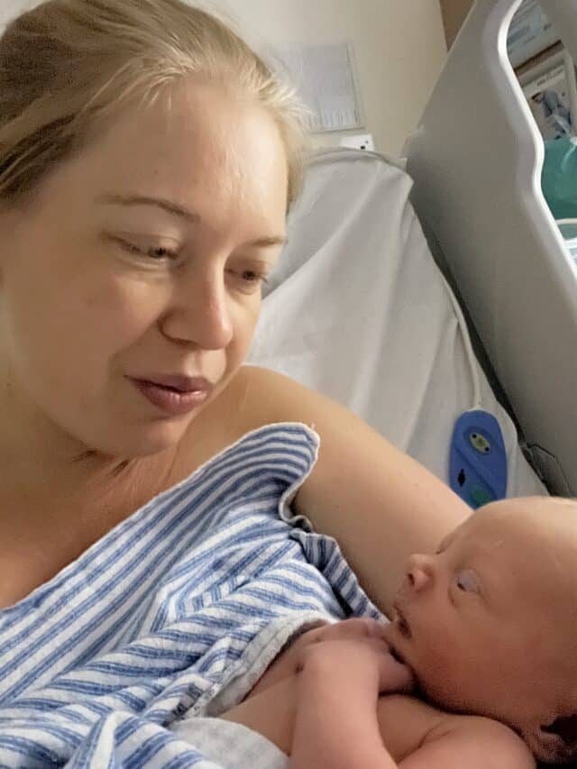 Chloe holding newborn baby